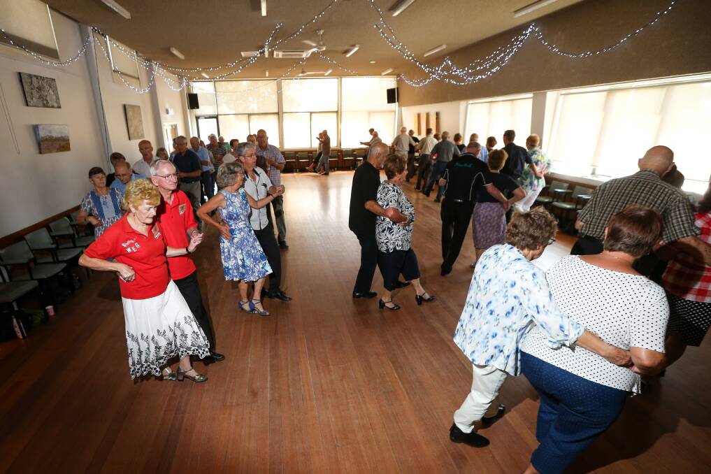 WEEKLY DANCE: Guided by instructor Neville Pearce, couples circle the floor at Wodonga Senior Citizens Centre. Picture: JAMES WILTSHIRE