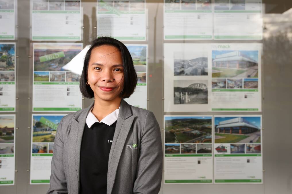 CAREER PATH: Charis Inoc had studied accounting in the Philippines before immigrating to Australia. Her sister Iris Claire also works at Ray Mack Real Estate while her brother Clarence is an apprentice butcher. Picture: JAMES WILTSHIRE