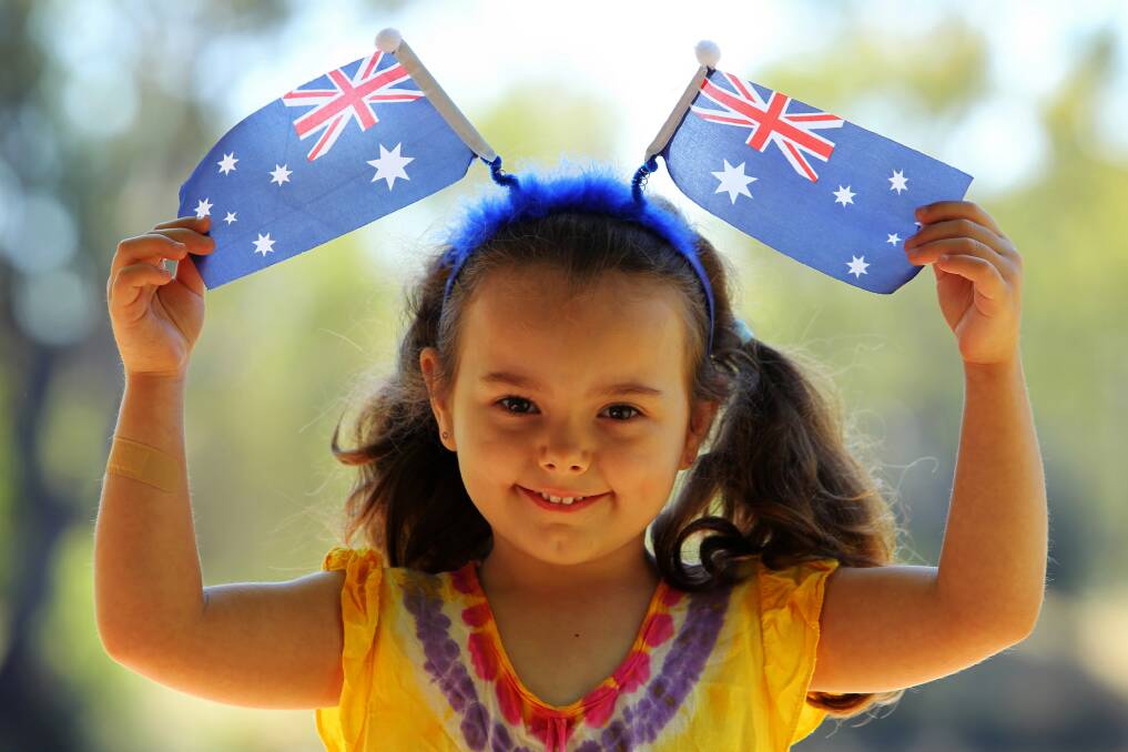 Shara Johnson, 4, of Albury, shows off her patriotism with her Aussie flag headband. Pictures: MATTHEW SMITHWICK