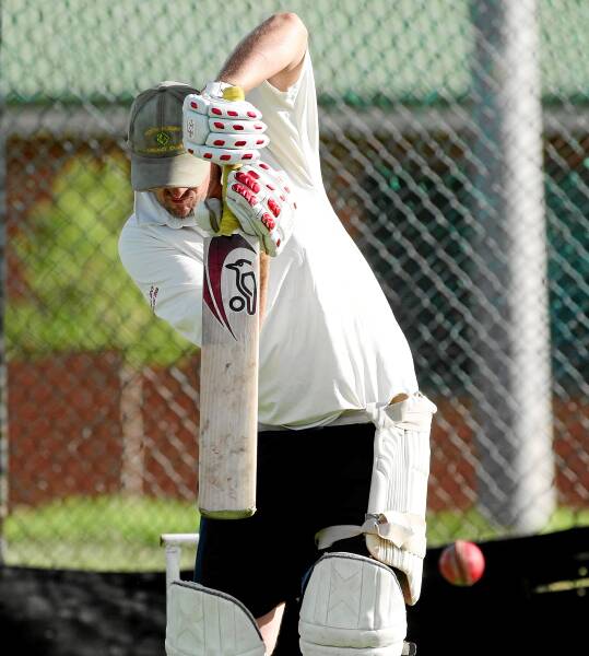 Rod Barton defends in the nets.