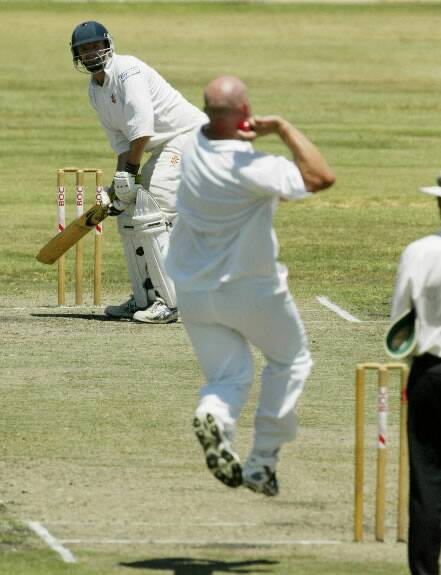 Heath Naughton bowls to Rod Barton ... both were selected in Joe Wooding's Team of the Decade.