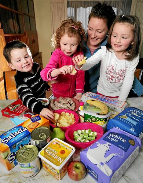 The Stewart family, Billy, 2, Caitlin, 6, mum Timele, and Jessica, 5, are enjoying the benefits of no food additives. Picture: KYLIE GOLDSMITH