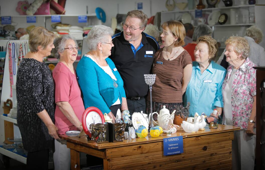 Centre president Marjorie Tomlinson (third from left) and retail manager Alan Dickens with volunteers Bernie Pearce, Pat Whitty, Rosemary Downing, Nellie Sheridan and Mary Fitzgibbon. Picture: TARA GOONAN