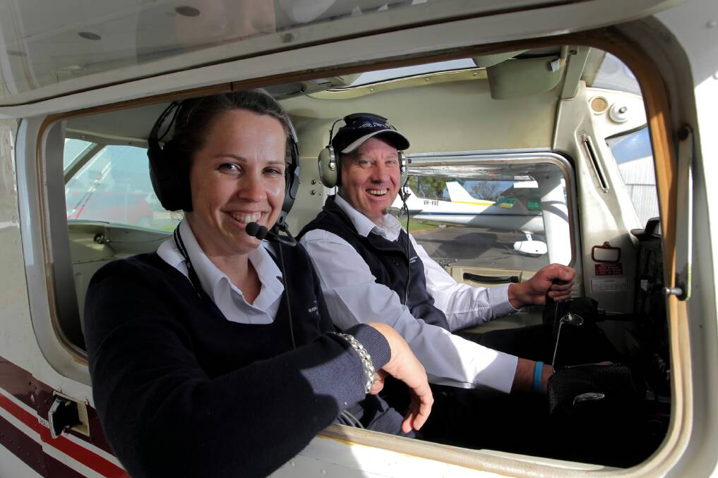 Riverina Aviation College’s Rhena Geraghty and Ian Bennett at the flying school. Picture: DAVID THORPE