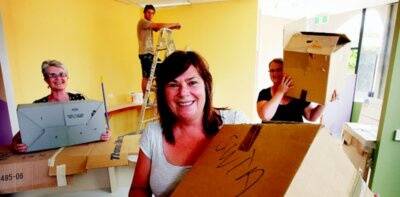 l Kate Martin, of South-West Tenants Advice, Di Glover and Chantelle Guthrie, of Homes Out West, unpack while Tim Esler puts on the finishing touches at YES Youth and Family Services new home. Picture: MATTHEW SMITHWICK