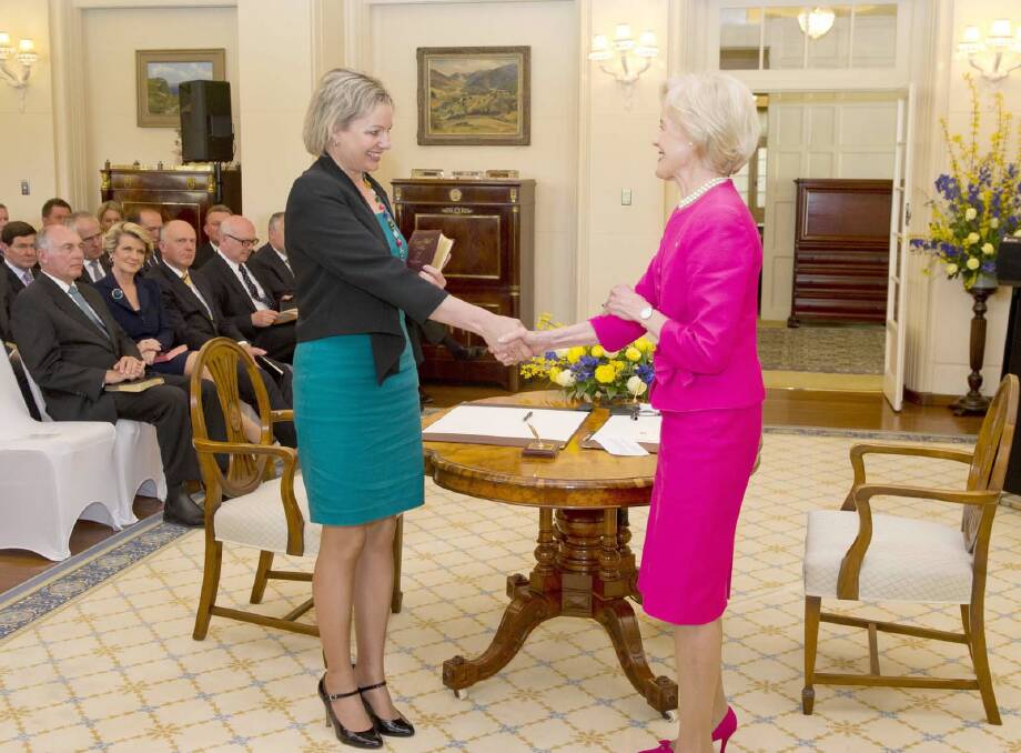 Sussan Ley is sworn in by Governor-General Quentin Bryce at Government House in Canberra yesterday.