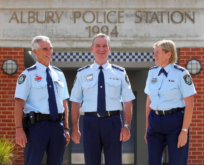 Inspector David Cottee, NSW Police Commissioner Andrew Scipione and Superintendent Beth Stirton outside Albury police station chatting about ways to improve local policing. Picture: Matthew Smithwick