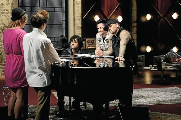 Scott Aplin with Joel and Benji Madden rehearsing with two of the contestants on The Voice.