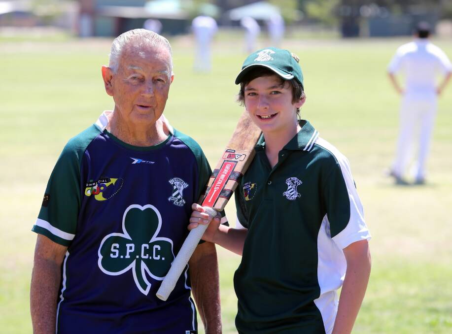 St Patrick’s life member Norm Wighton with Ryan Lade at Xavier Oval on Saturday for the match against Lavington. Picture: PETER MERKESTEYN