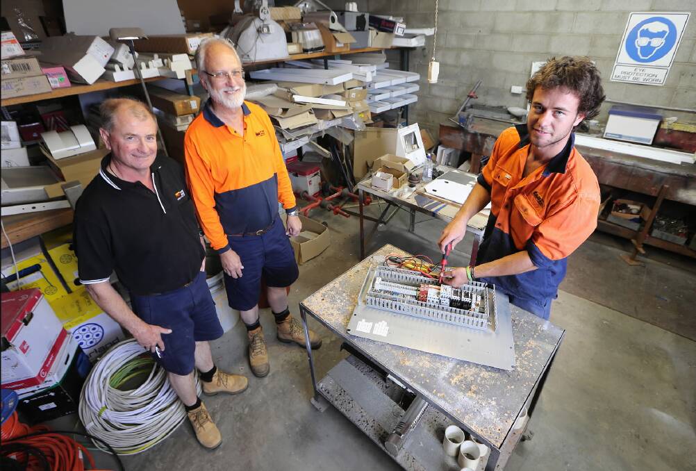 David Allen, Kevin Paech and apprentice Dom Wild at their Albury business, Torney and Allen Electrical Contractors. Picture: JOHN RUSSELL