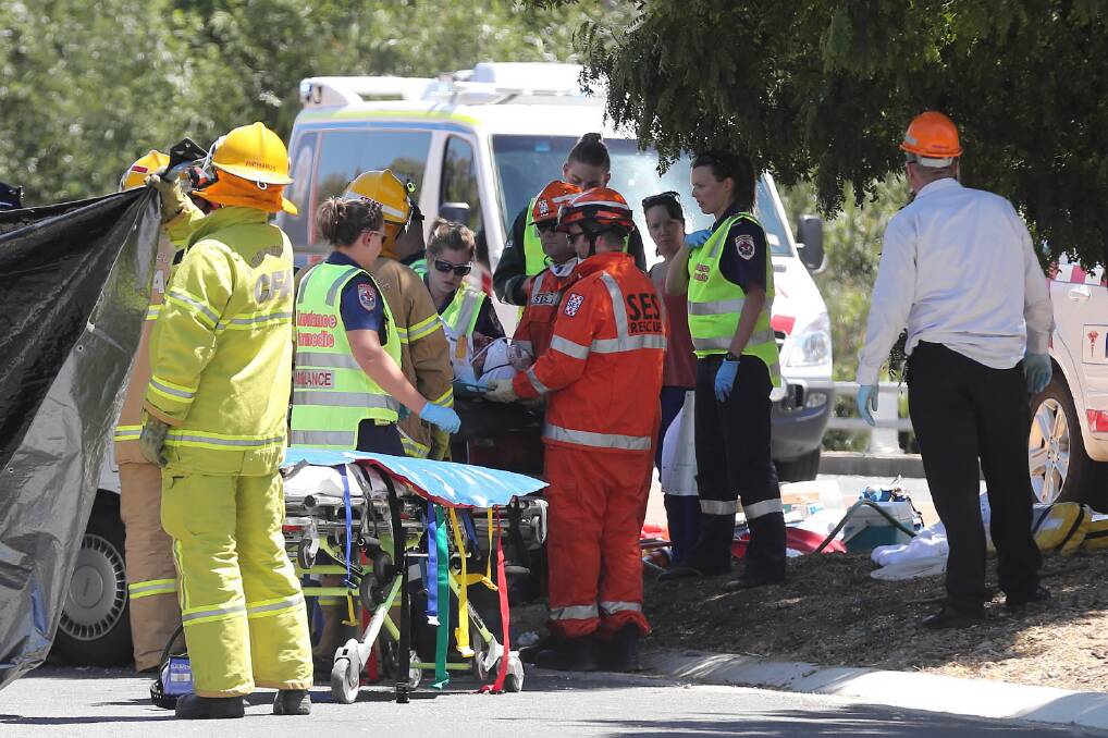 The driver of the crashed car was flown to Royal Melbourne hospital with serious head injuries. Pictures: JOHN RUSSELL 