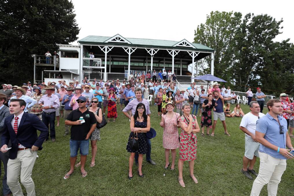 In spite of the grandstand being out of bounds, a strong crowd still attended the Towong Cup. All eyes were on the horses during the final race of the day that put on clear skies and sunshine for the punters. Picture: MATTHEW SMITHWICK