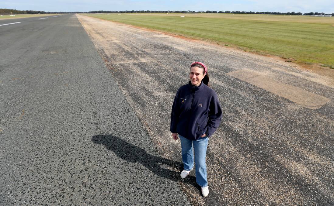 Grietje Bruinsma at the Corowa Airport runway, which has been undergoing a revamp she says is hurting her gliding business.