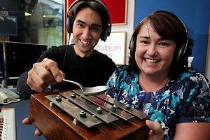 Joseph Thomsen and Gaye Pattison with an antique xylophone used to announce the news on ABC radio. PICTURE: David Thorpe.