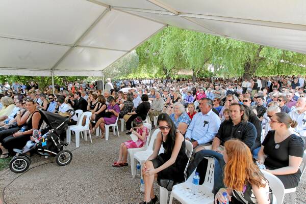 About 1200 friends, old and new, from all walks of life, and dozens of children, gathered in the King Valley yesterday to celebrate the life of Barb Sartori, who died when fire razed the Whitfield General Store fire two weeks ago. Picture: TARA GOONAN