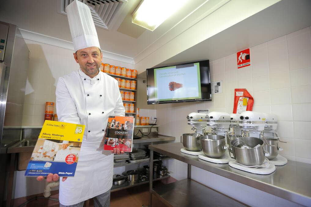 Albury TAFE commercial cookery teacher David O’Dea is the face of the new local White and Yellow Pages for his work with apprentice chefs. Picture: TARA GOONAN