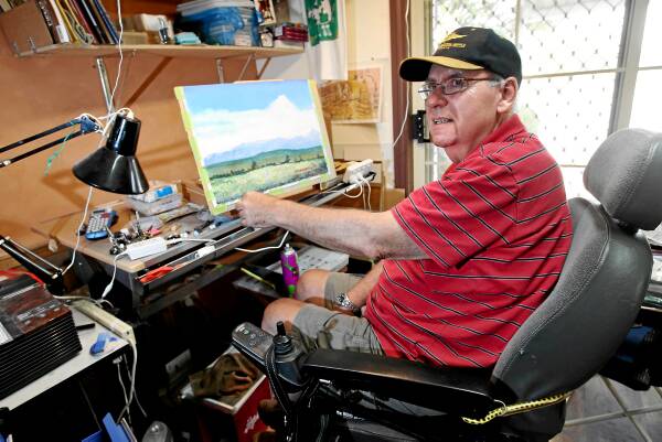 Artist and stroke survivor Doug Hoth prepares for his exhibition. Picture: BEN EYLES