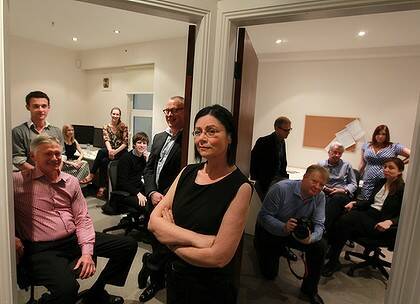 Front, from left: Graeme Wood, Monica Attard and staff at The Global Mail.