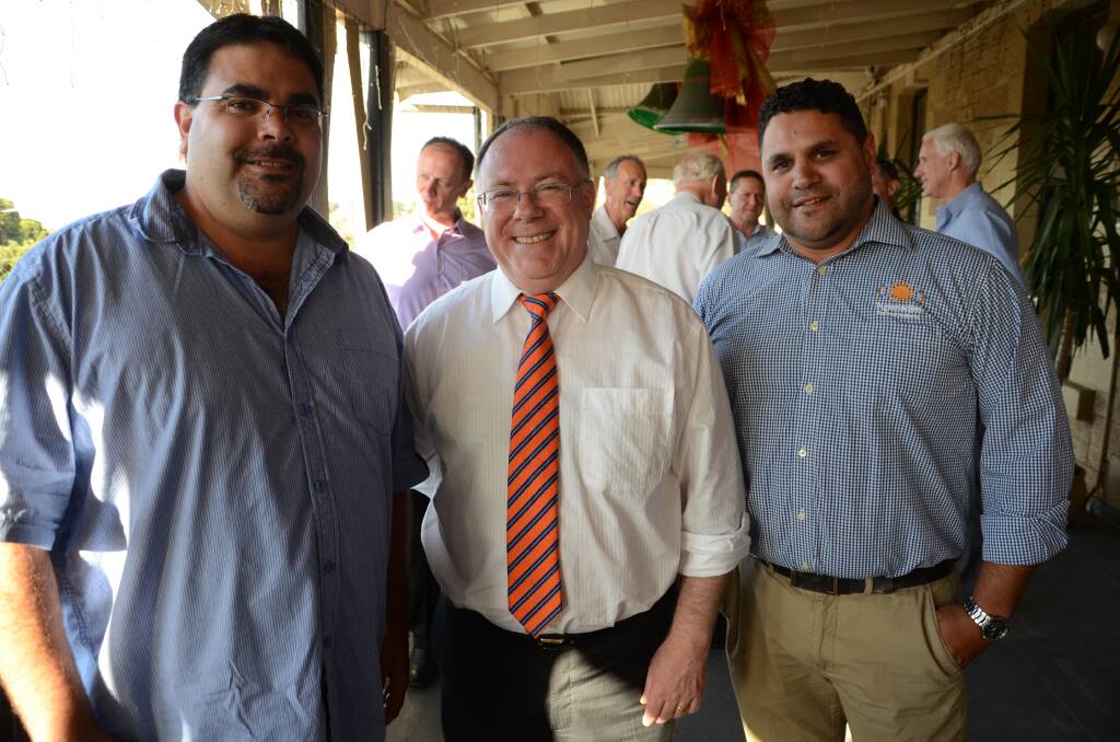 Won't back down: Sustainability, Conservation and Environment Minister Ian Hunter, centre, pictured with the Ngarrindjeri Regional Authority's Tim Hartman and Clyde Rigney, says he will not back down on a Murray-Darling funding deadlock with New South Wales.