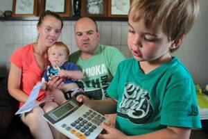 Ester Gannon, Bailey Gannon, 18 months, Jason Gannon and Ollie Gannon, 3, weigh up whether it is economical to continue with both parents working.