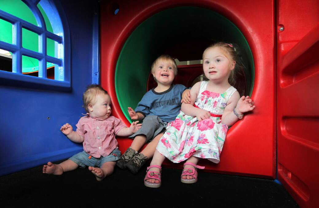 Angus Glogolia, 10, months, Joshua Cave, 2, and Aida Hamblin, 3, are children living with Down syndrome and their parents are encouraging other families to join a support group. Picture: DAVID THORPE