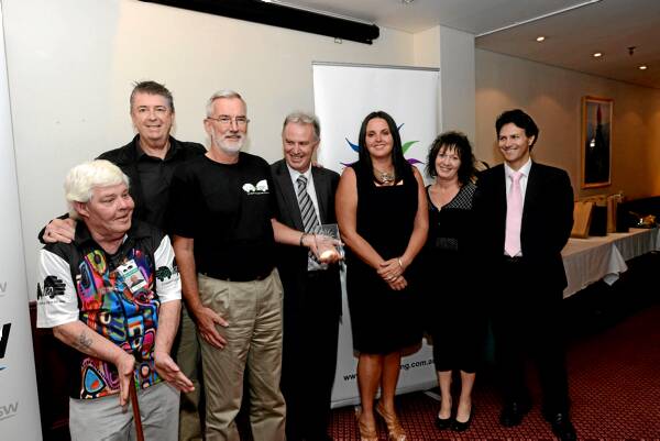 Snowie, John Brabant, David Dow, Daryl Betteridge, Jodie Tiernan, Sally Wilson and Victor Dominello after Carevan was named NSW Volunteer Team of the Year in Sydney.