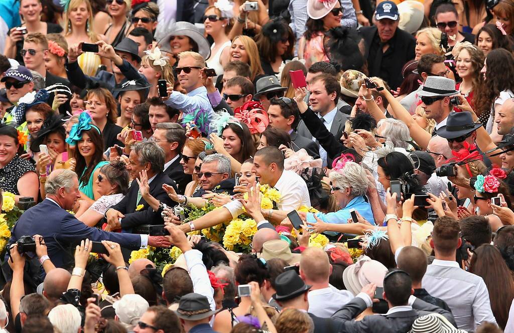 Prince Charles, Prince of Wales greets fans during 2012 Melbourne Cup Day at Flemington Racecourse in Melbourne, Australia.