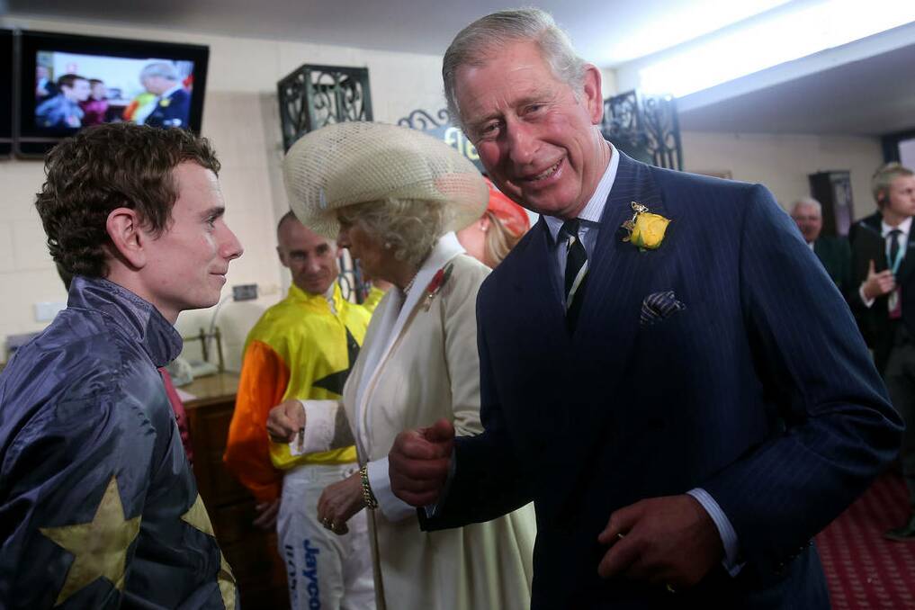 Prince Charles, Prince of Wales (R) and Camilla, Duchess of Cornwall (C) speak with jockey Ryan Moore on Melbourne Cup Day at Flemington Racecourse in Melbourne, Australia.