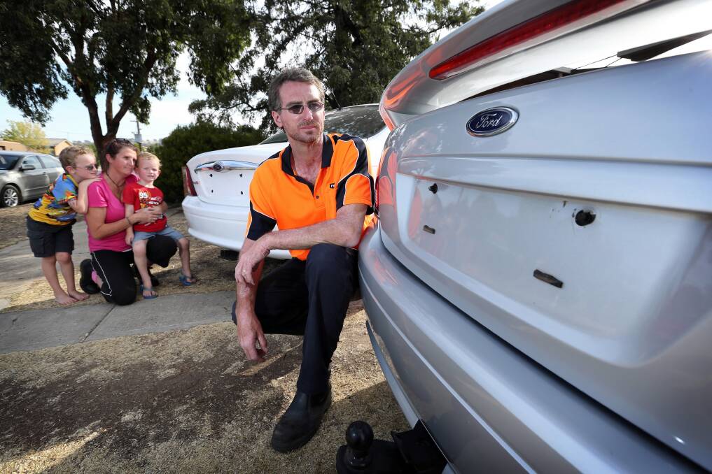 Michael Enever and Kylie Konieczny, pictured with their children Nathan and Ashton, are angry that someone stole their personalised number plates from outside their home. Pictures: MATTHEW SMITHWICK