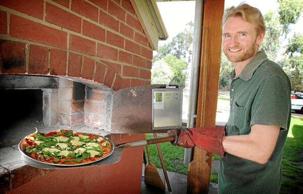 Greens candidate Colin Hesse served up pizza and a campaign launch yesterday. Picture: TARA ASHWORTH