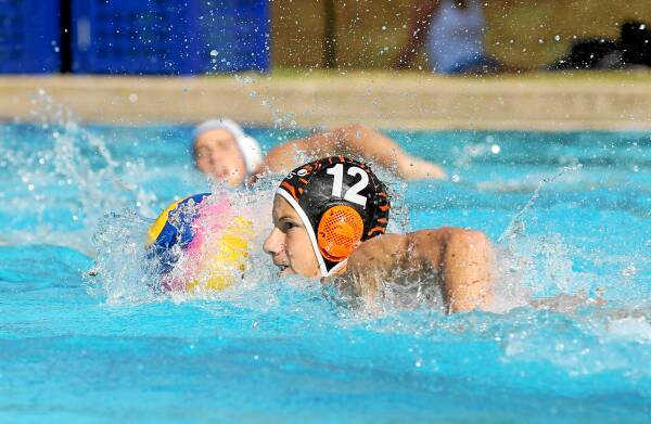 Albury’s Harry Duck pushes the ball down the pool in the match against Northside. Picture: BEN EYLES