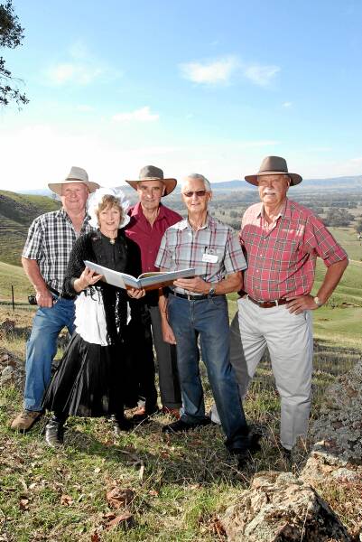 Heritage group members Doug Brockfield, Chris Powell, John Brown, Neil Brock and Don McQueen launch the Oxley Plains book on a ridge top near Milawa yesterday. Picture: MARK JESSER