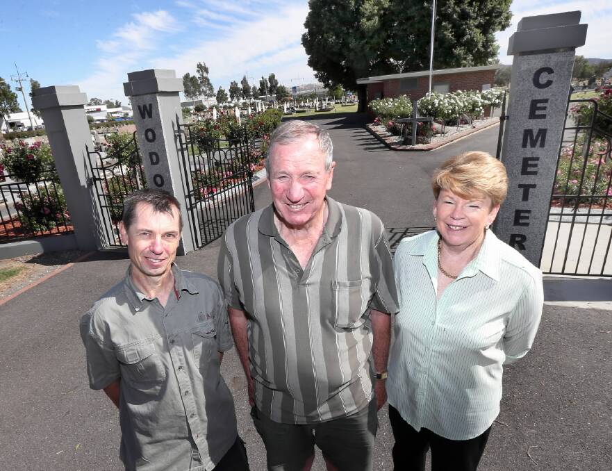 Outgoing Wodonga Cemetery Trust member Graham Gehrig, centre, with incoming members Lubosh Hanuska and Ceryn Campbell at the cemetery. Picture: Peter Merkesteyn