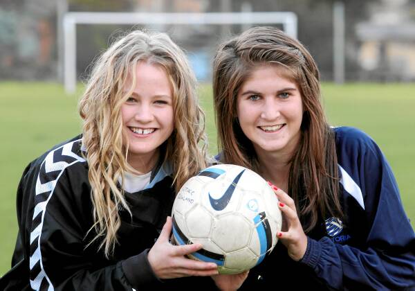 Grace Rowland, 15, and Brianne Buckingham, 15, are ready for action. Picture: PETER MERKESTEYN