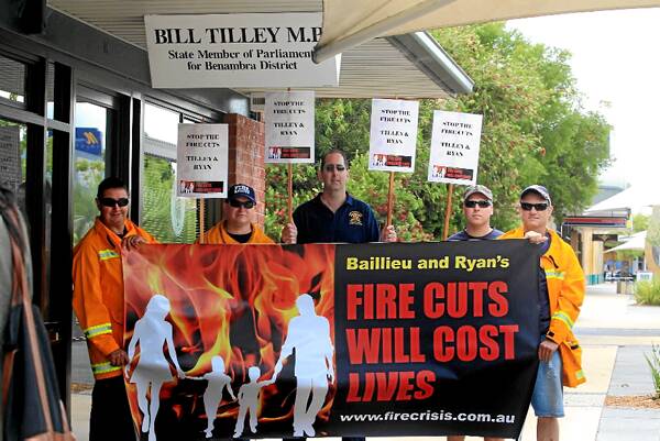 Firefighters Kris Dykes, Scott Schilling, Murray Walker, Brett Myers and Andy Nicholls protest outside Bill Tilley’s office. Picture: PETER MERKESTEYN