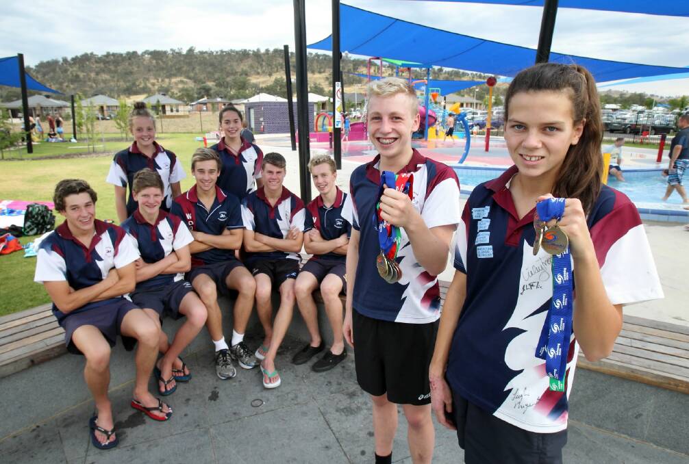 Heath MacLeod 14 and Zoe Deacon 13 at front with their medals, with other club members James Jarrous 16, Ben Bayes-Smith 14, Harrison Lowe 15, Sean Hennessy 16 and Euan Macleod 16, and standing at rear Georgia Polkinghone 13 and Olivia Plunkett 16. Picture: MARK JESSER