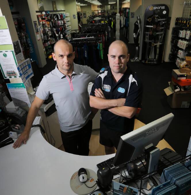 Sportsmans Warehouse store owner Luke Sims and manager Steven Burke are determined to find the man who stole more than $7000 during a break-in at the Dean Street store. Picture: TARA GOONAN