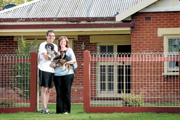 Peter and Nicole Cornell, pictured outside their home in Albury, say interest rate cuts won’t make much difference to their mortgage repayments. Picture: JOHN RUSSELL