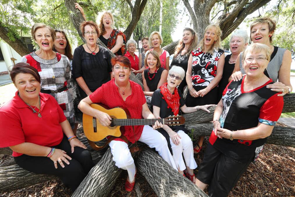 Karen Roben, leading Vital Voices Choir, says singing has helped her cancer fight. Picture: JOHN RUSSELL