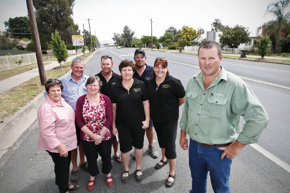 Matthew Pitzen and fellow Holbrook traders Marree Haynes, Mick Pitzen, Christine Murphy, Wes Black, Lisa Wheeler, Brad Wheeler and Carla Black say a 24-hour Caltex station would be good for their town. Picture: BEN EYLES