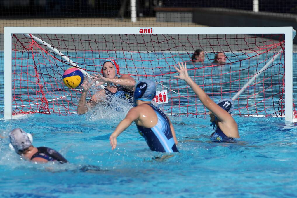 Hurricanes’ goalie Elena Gigli moves to her right in an attempt to block against the Victorian Seals yesterday at WAVES Wodonga. Pictures: MATTHEW SMITHWICK