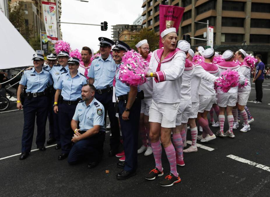 Albury police Superintendent Beth Stirton, third from left, led the NSW Police march in the Mardi Gras parade on Saturday night. Picture: FAIRFAX