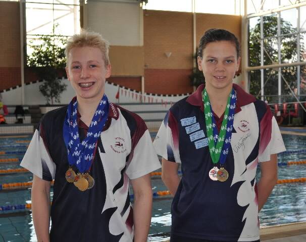 Wodonga’s gold-medal winning state shortcourse duo Heath Macleod and Zoe Deacon.