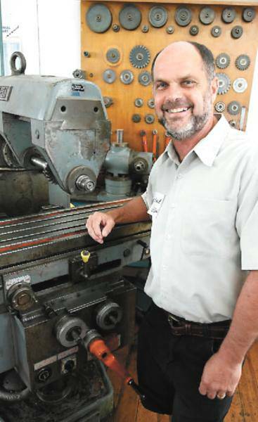 Wayne Braybrook on Saturday with the machine he used studying metalwork in 1968.