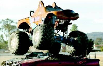 Monster truck Scooby Doo crushes cars as part of the action during the monster truck show at the Albury Showgrounds on Saturday night. Despite complaints, organisers say they will return to the Border. Pictures: GLENN HENDERSON