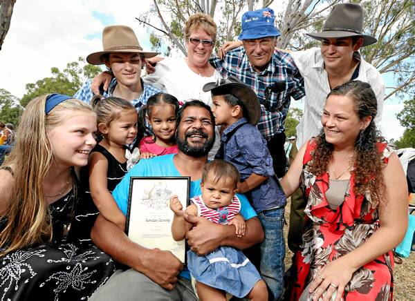 Ravi Gill with his family: back, Duncan Burgess, 17, Christine Dodd, Bryan Dodd, and Troy Burgess, 15; front, Emily Burgess, 11, Jasira Gill, 3, Jane Gill, 4, Mr Gill holding Jeunesse Gill, 8 months, Johnathan Gill, 4, and wife Simone.
