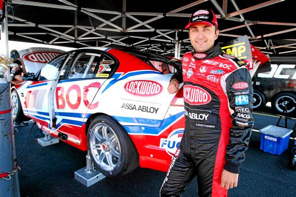 Fabian Coulthard with the new car for this year’s V8 Supercars season. Picture: MATTHEW SMITHWICK