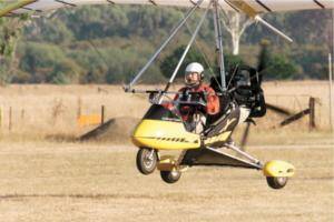 Dave Jacka comes in to land at the Eagle School of Microlighting in Bright after making a flight. Pictures: RAY HUNT