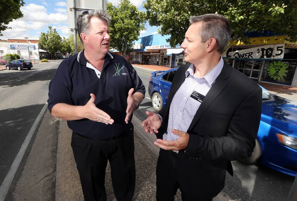 Chamber of Commerce president Brett Drinnen and the Wodonga Council’s Matt Taylor discuss the redevelopment of High Street.
Picture: JOHN RUSSELL