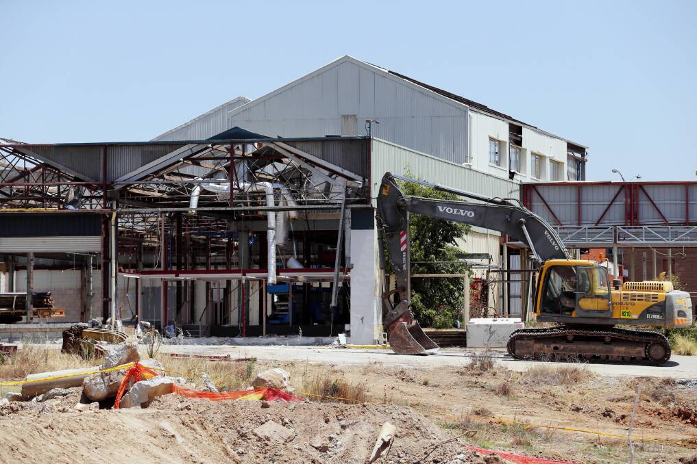 The former Wodonga Highpoint and Manns buildings are being “dismantled”. Picture: JOHN RUSSELL